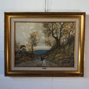 Olio su tela firmato A. Comitale raffigurante un paesaggio boschivo con due figure femminili in cammino, cornice dorata,