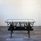 Tavolino in vetro ricavato da antico carretto siciliano in ferro battuto, fine XIX – inizi XX secolo.